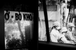 A Saigon, devanture boutique et famille sur un scooter, Mai 2014© Photo Deborah Metsch